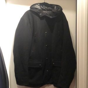 Winter pea coat with hood and extra warm liner.